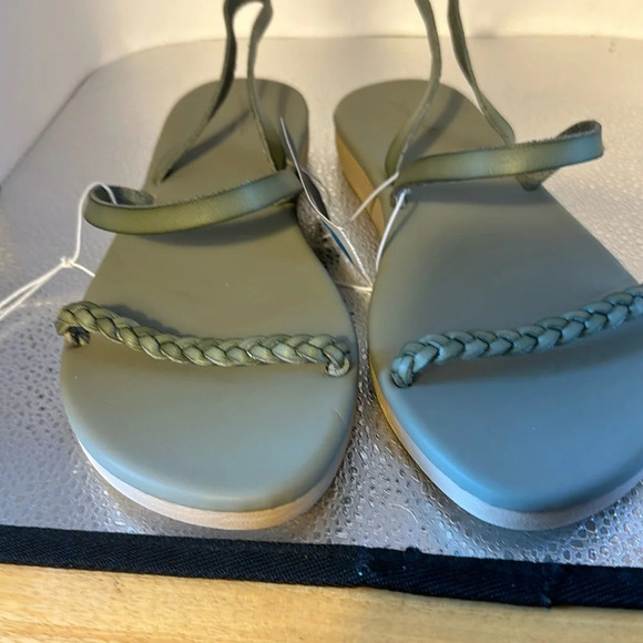 Universal Thread Shoes - Universal thread very pretty green sandals. They are a slip on with a strap​